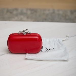 Diane von Furstenberg red patent leather clutch